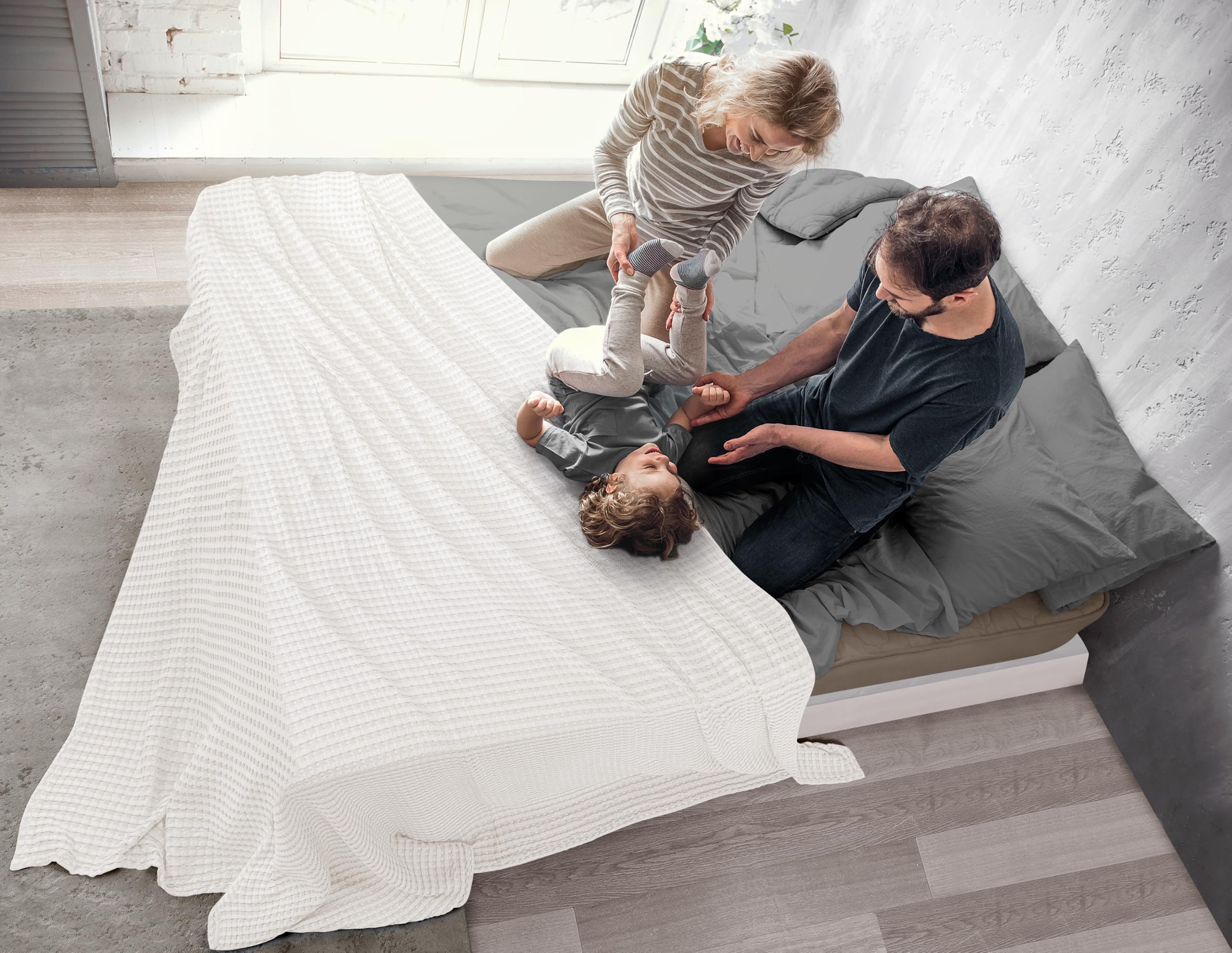 Utopia Bedding folded on a sofa to show compact storage and everyday convenience
