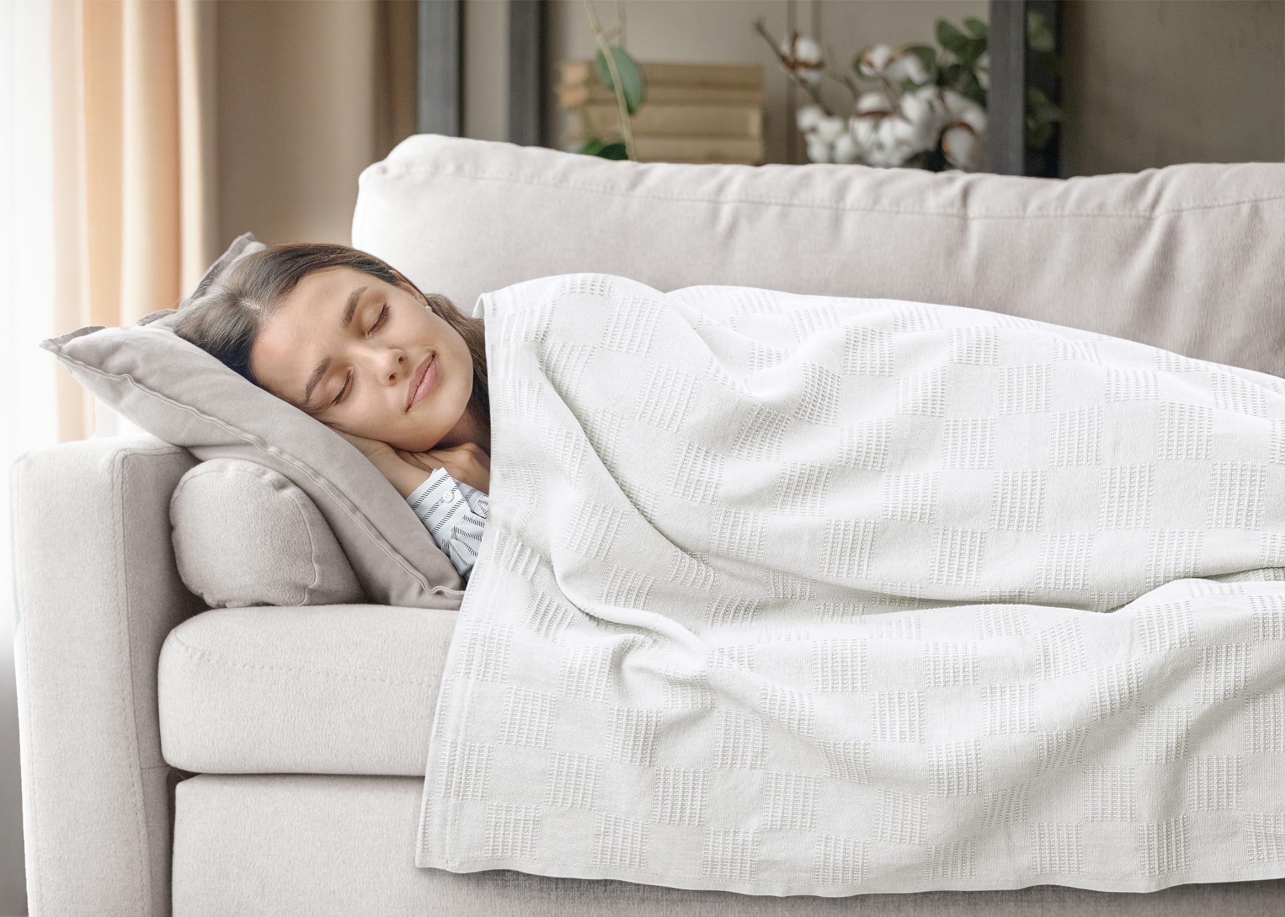 Utopia Bedding styled on sofa creating a cozy, inviting living space