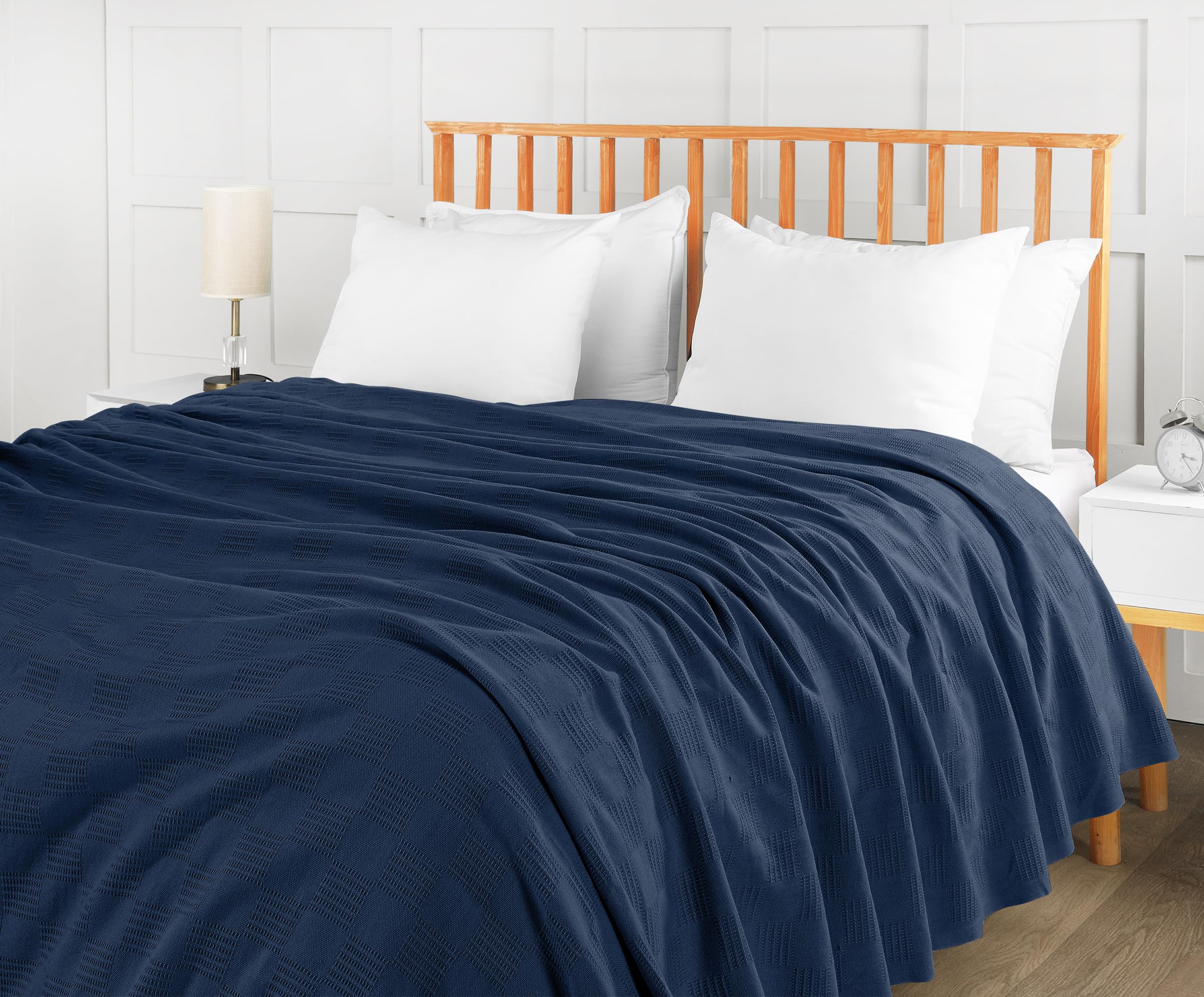 Utopia Bedding corner close-up showing hem detail and durable finish benefit