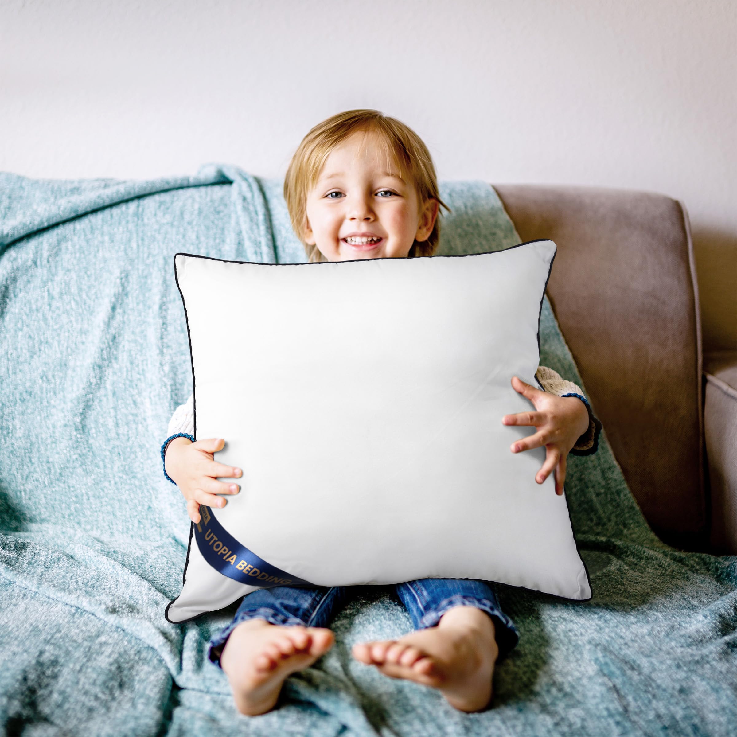 Utopia Bedding paired with decorative covers illustrating styling versatility