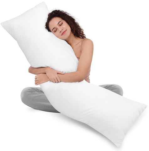 Utopia Bedding pillow next to measuring tape showing 20x54 size for scale
