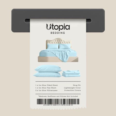 Utopia Bedding folded sheets beside ruler showing true king size fit