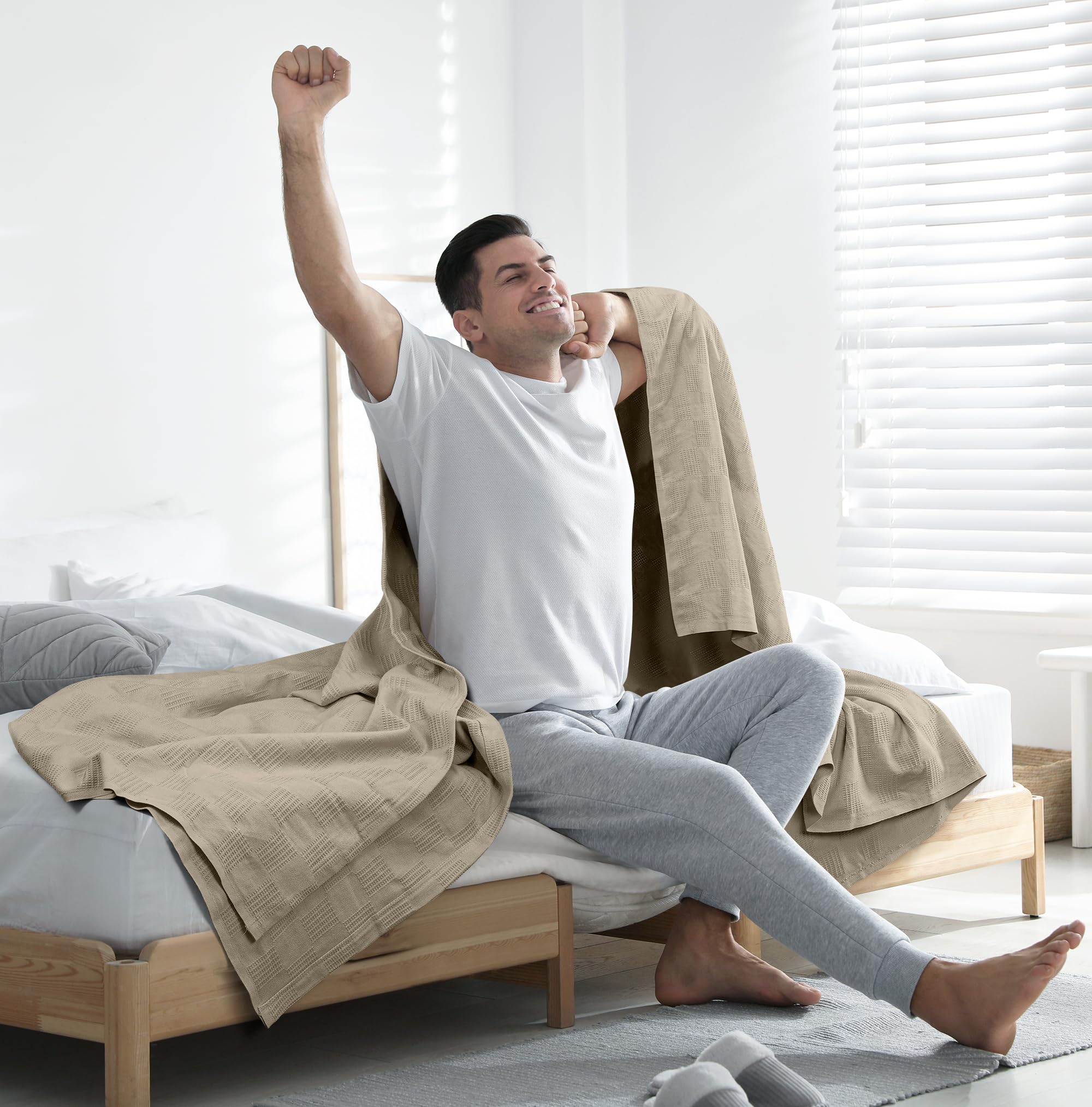 Utopia Bedding casually draped over sofa showing versatile use and cozy living-room appeal