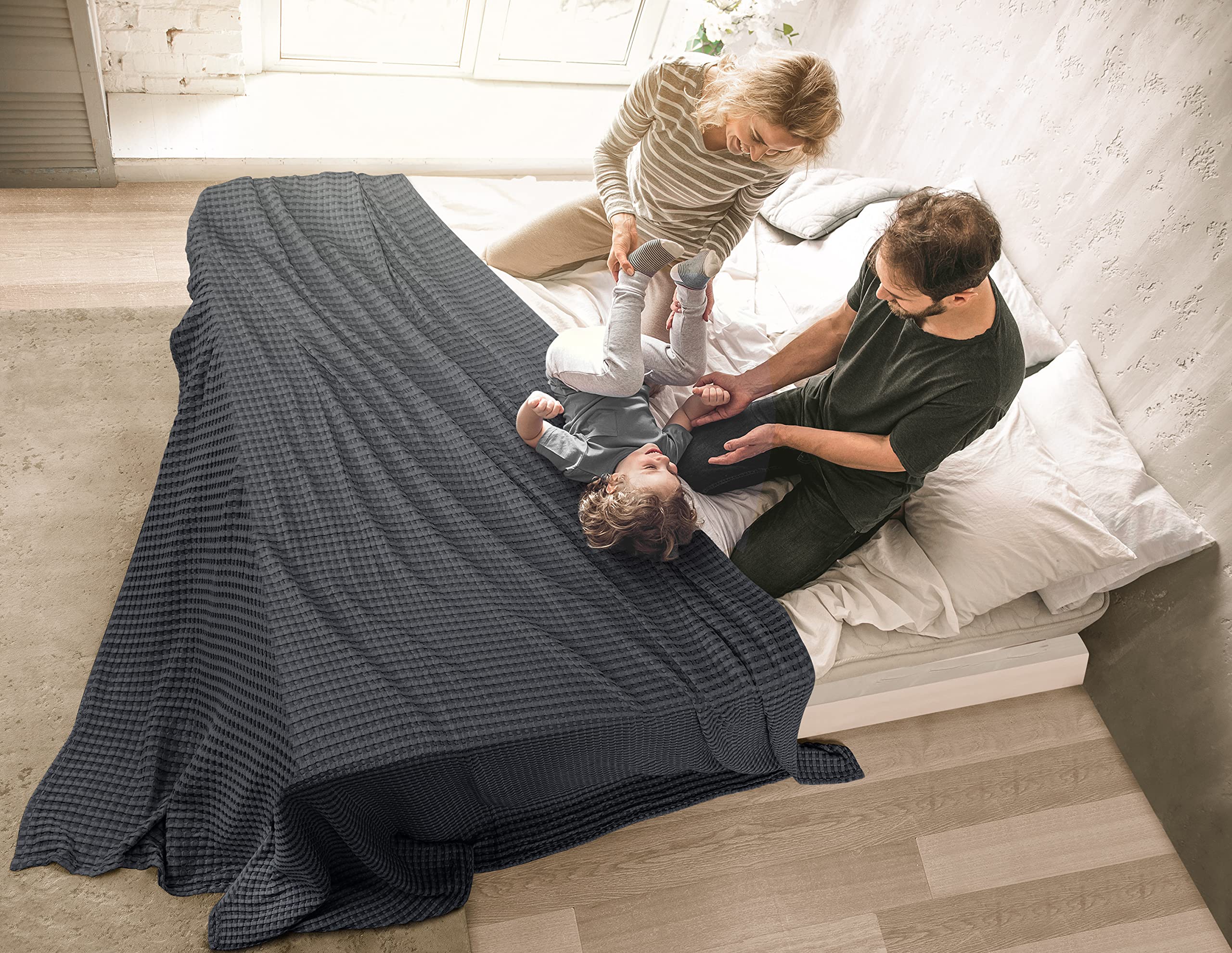 Utopia Bedding blanket beside pillow showing scale and generous coverage
