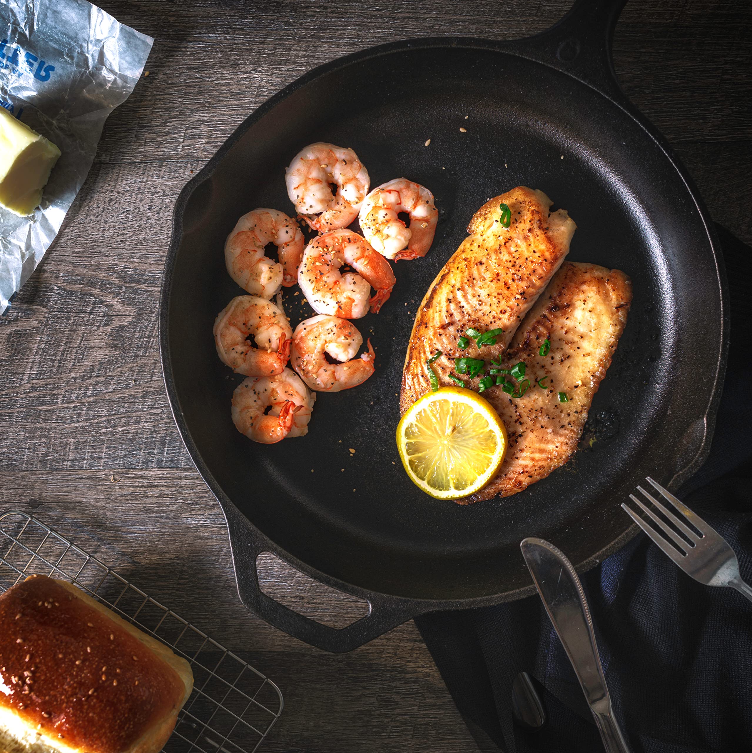 Utopia Kitchen skillet cooking over campfire illustrating outdoor versatility benefit