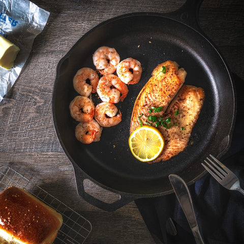Utopia Kitchen skillet cooking over campfire illustrating outdoor versatility benefit