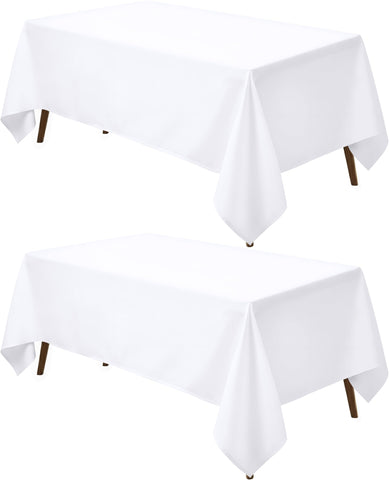 Utopia Kitchen front view of two white rectangle tablecloths, presents neat table styling