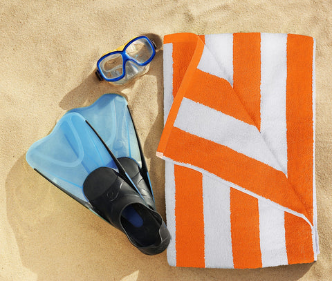 Utopia Towels absorbing water to show quick-dry performance after swim