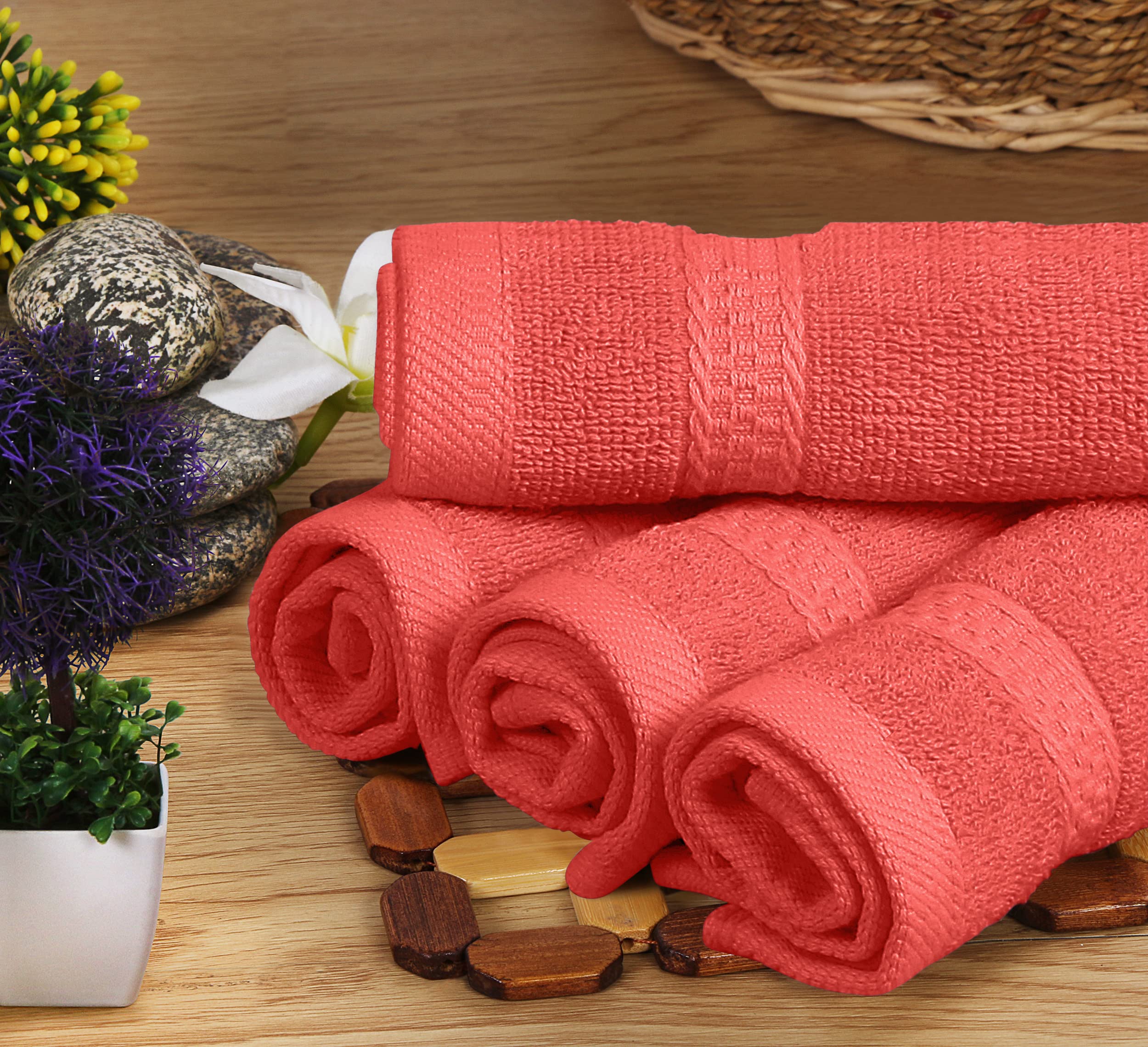 Utopia Towels styled in bathroom demonstrating coral color as decor accent