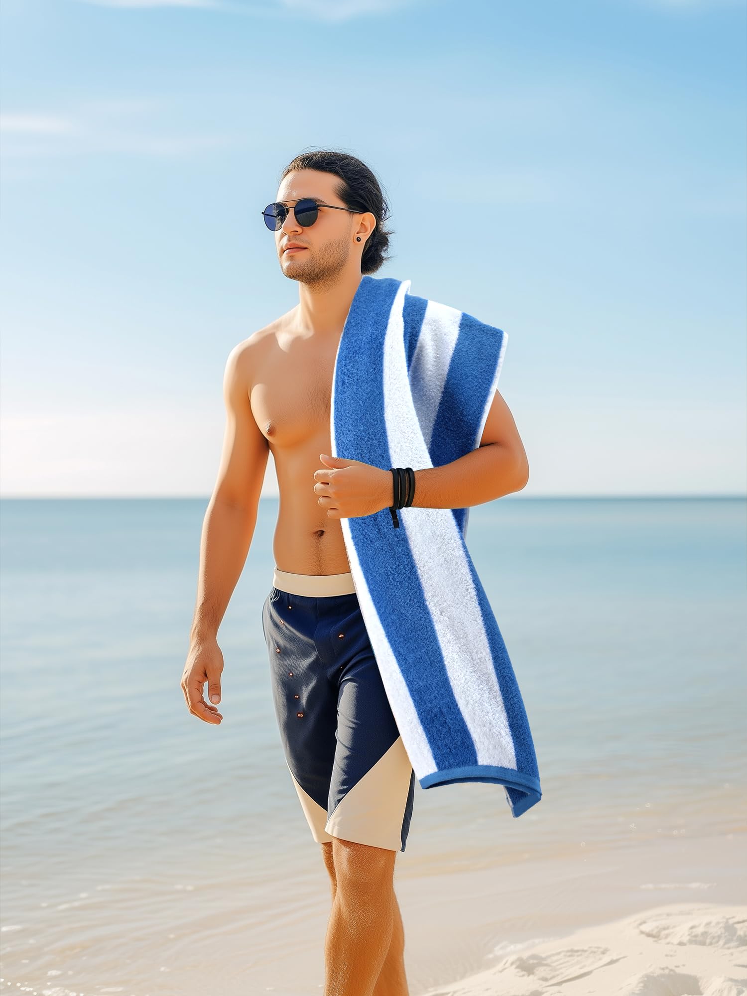 Utopia Towels draped over pool chair showing quick-dry, ready-to-use benefit