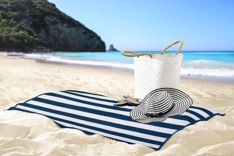 Utopia Towels family on beach enjoying colorful towels, versatile everyday use