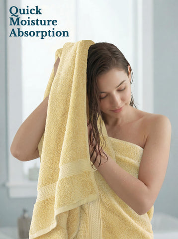 Utopia Towels absorbing water droplet to demonstrate high absorbency
