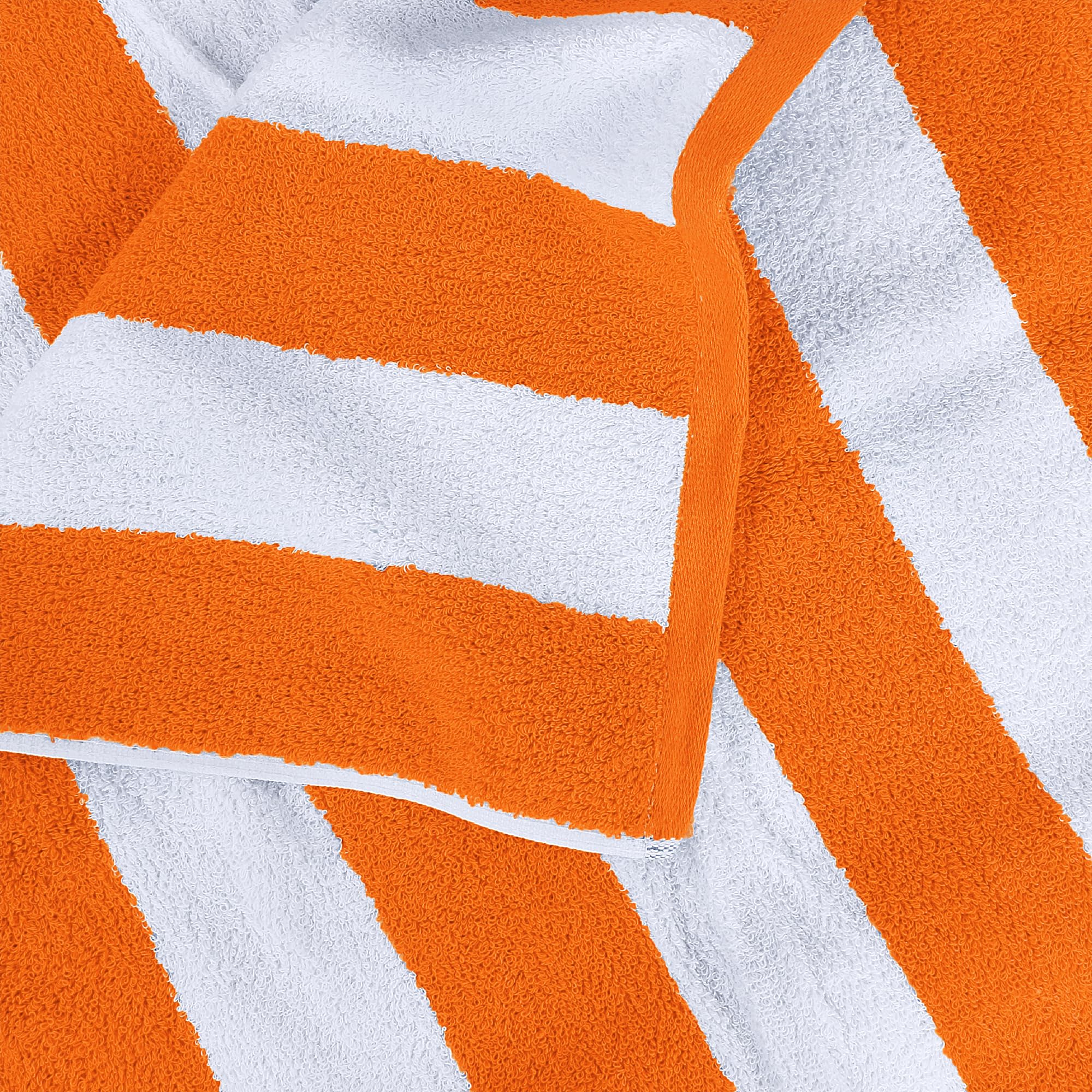 Utopia Towels folded compact in a beach bag for easy travel and packing