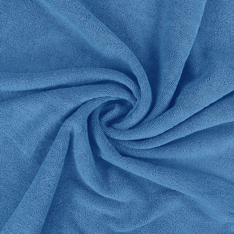 Utopia Towels folded stack on shelf showing tidy storage and vibrant electric blue