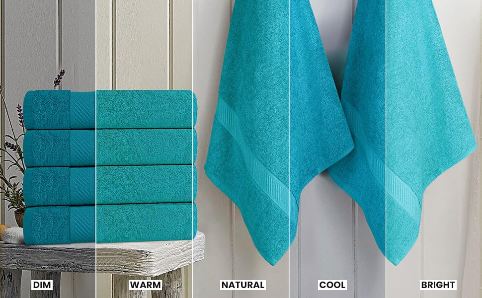Utopia Towels folded stack in bathroom showing coordinated turquoise styling