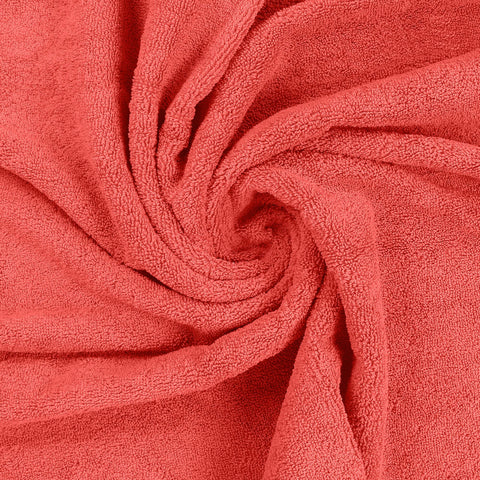 Utopia Towels folded in travel bag illustrating portability for trips and gym