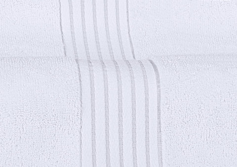 Utopia Towels hand towel stack beside sink conveying convenience and tidy look