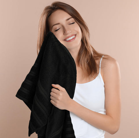 Utopia Towels hanging in bathroom illustrating quick access and decor benefit