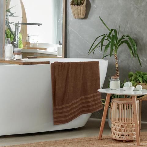 Utopia Towels in use as a person dries off, showing comfortable coverage