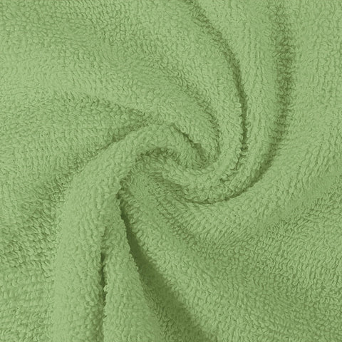 Utopia Towels on bathroom vanity showing sage towels adding calm decor