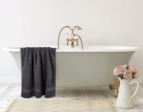 Utopia Towels placed by bathroom vanity showing stylish neutral color