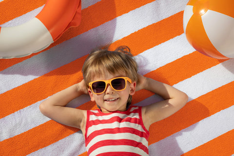 Utopia Towels draped over pool lounge chair for stylish poolside use