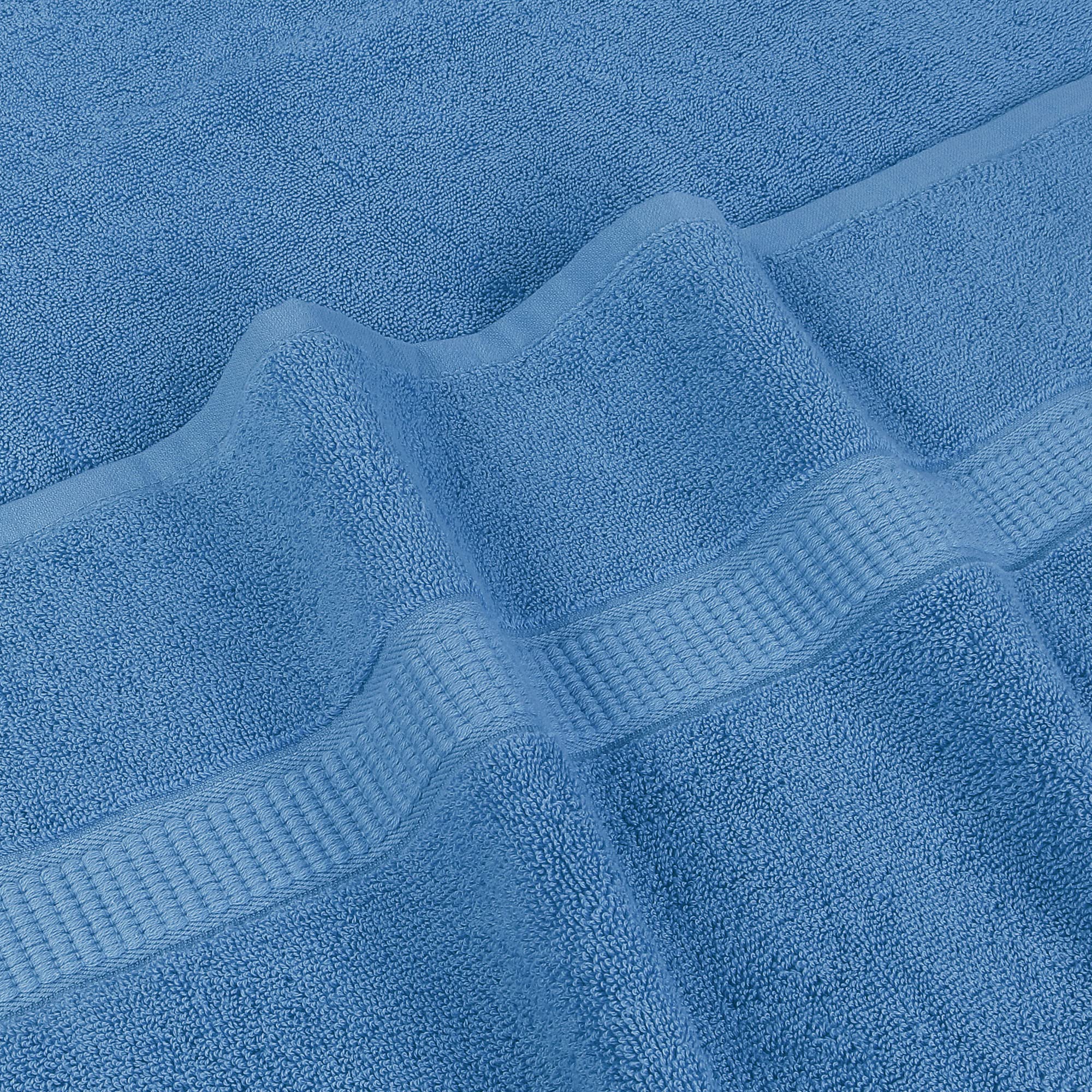 Utopia Towels laid on poolside lounge for quick dry-off and bright style