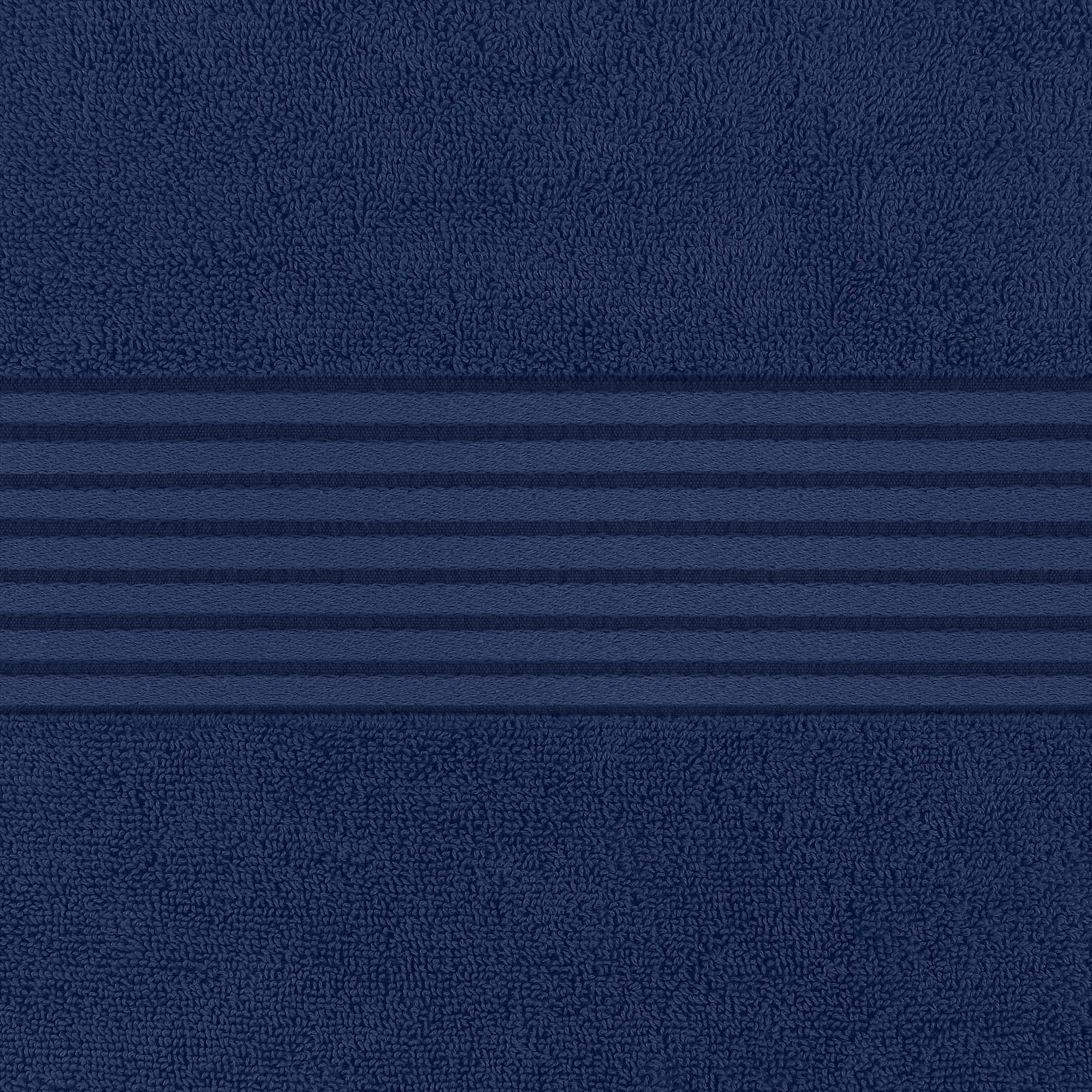 Utopia Towels packed in suitcase navy showing travel-ready absorbency