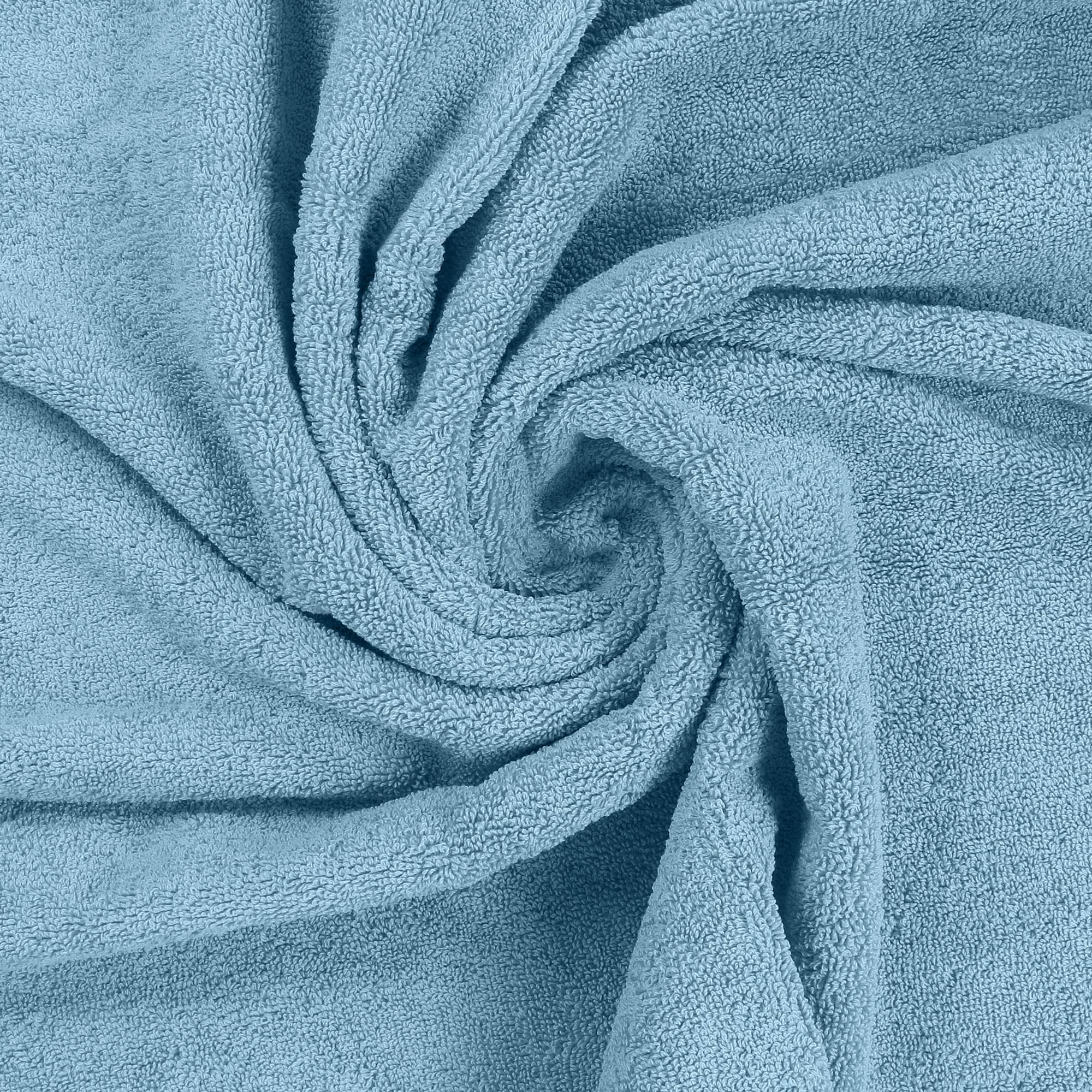 Utopia Towels compactly packed for travel showing portability advantage
