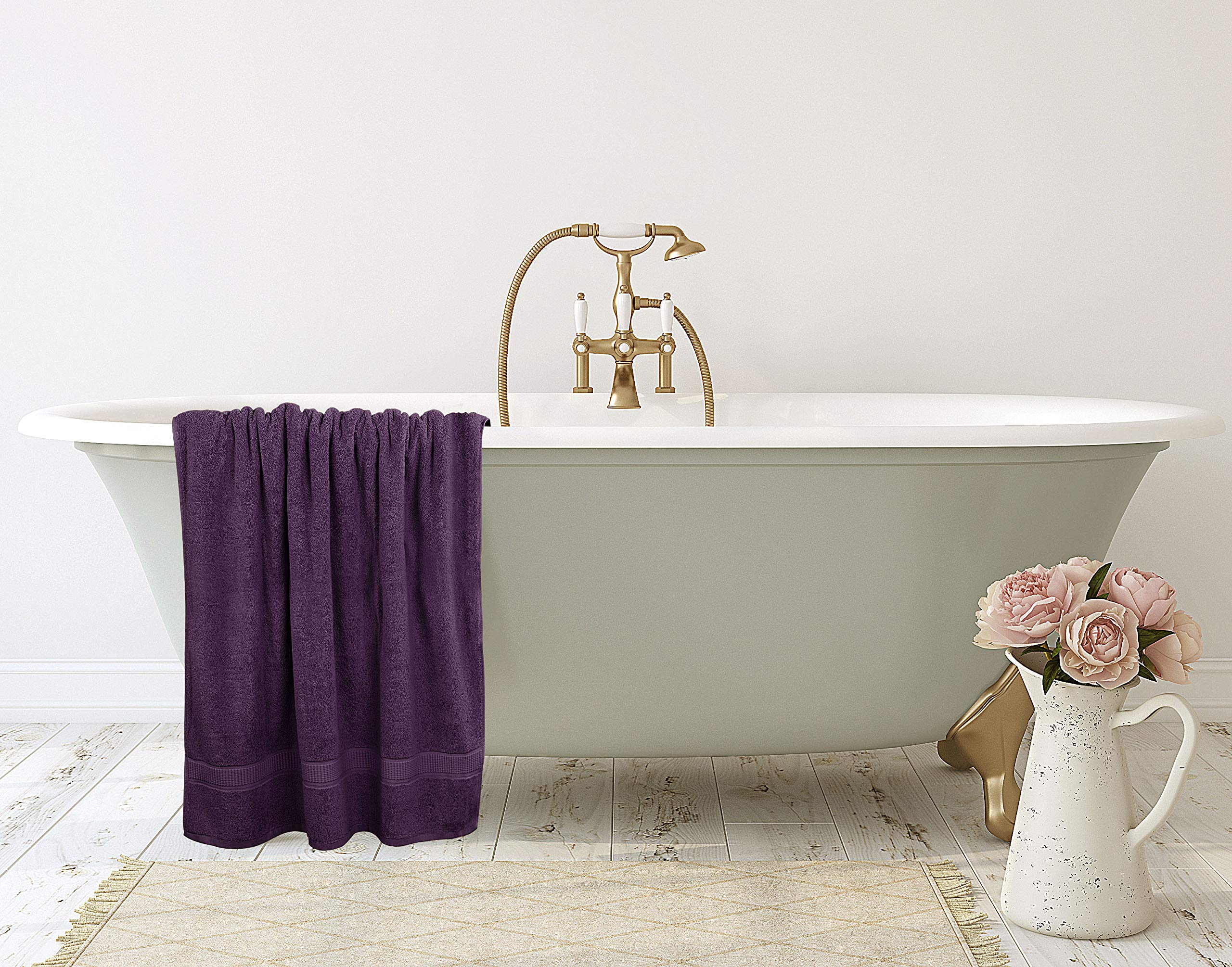 Utopia Towels next to ruler shows 35x70 inch size benefit: accurate scale