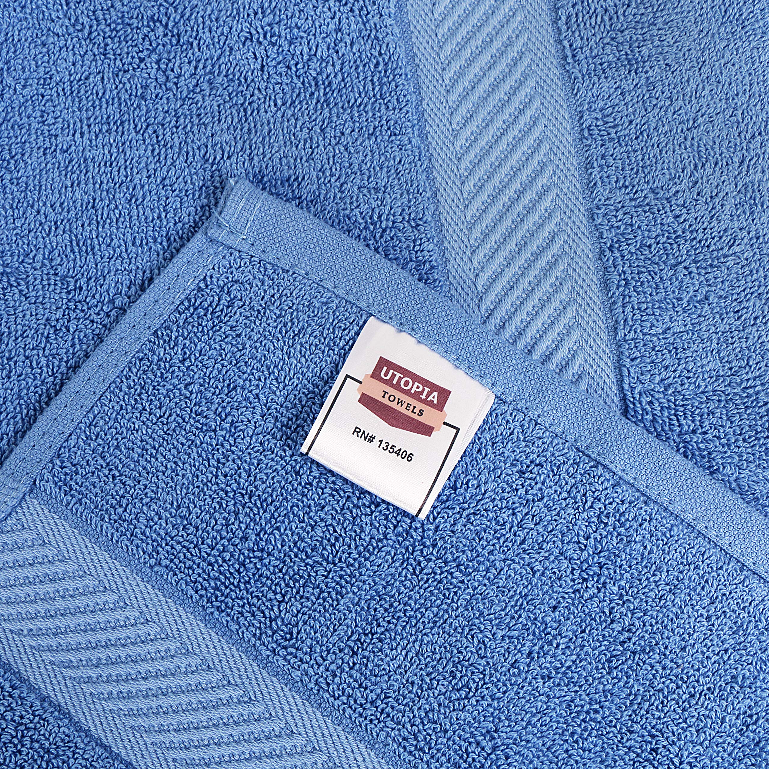 Utopia Towels draped poolside in use showing absorbency and bright color for outdoor settings