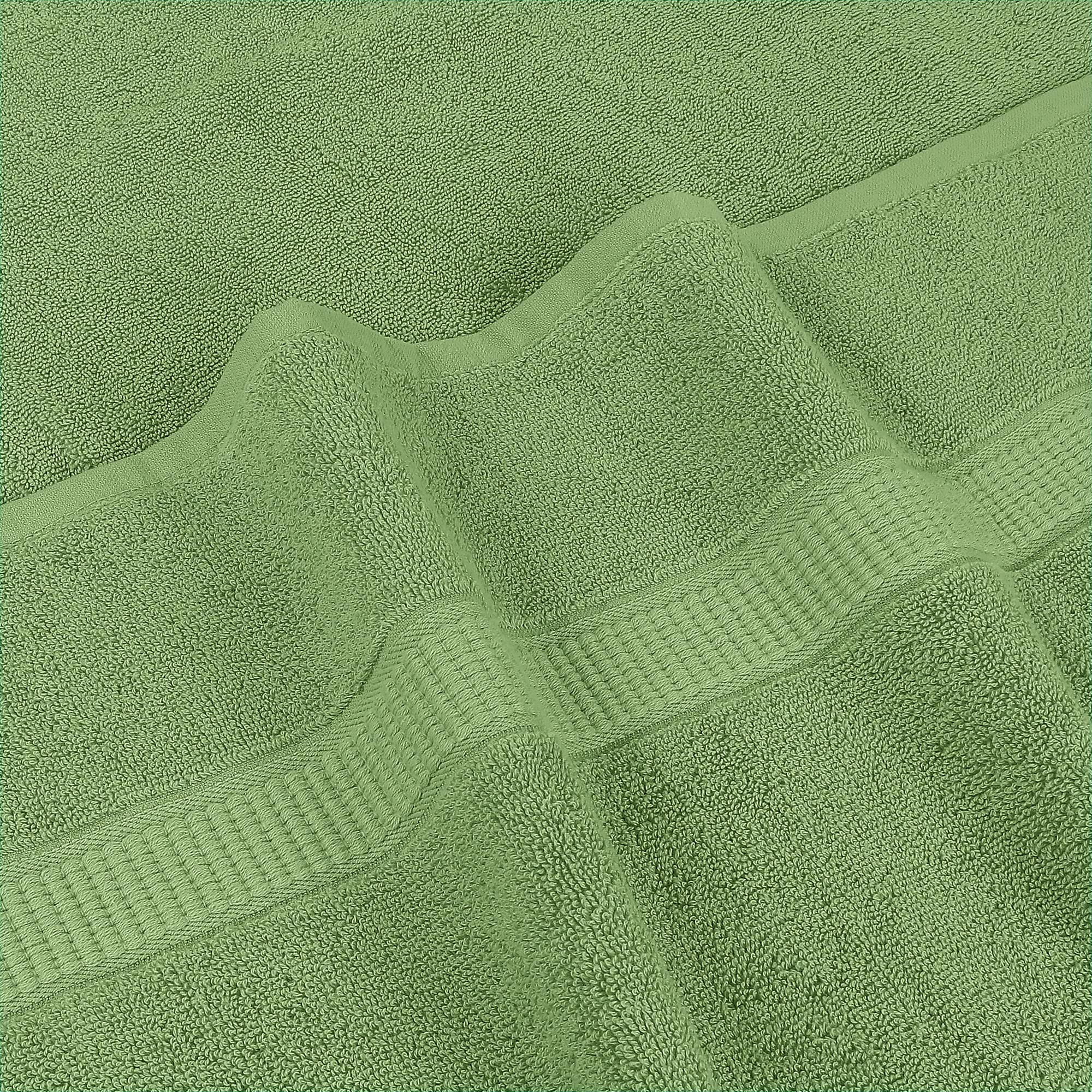 Utopia Towels beside a standard towel illustrating larger 35x70 inch size advantage