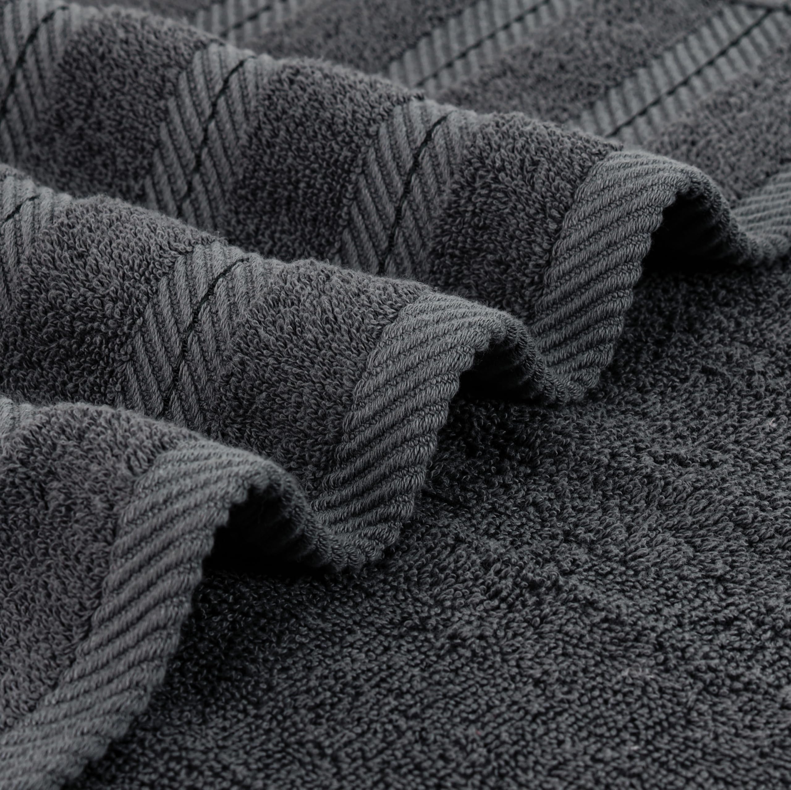 Utopia Towels size comparison with ruler showing 30x60 inch scale and large coverage