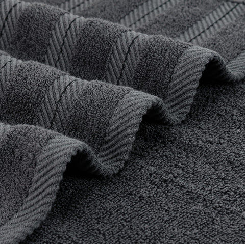 Utopia Towels size comparison with ruler showing 30x60 inch scale and large coverage