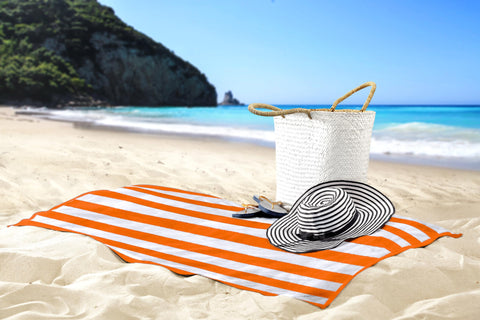 Utopia Towels next to sandal to show true-to-life 30x60 size comparison