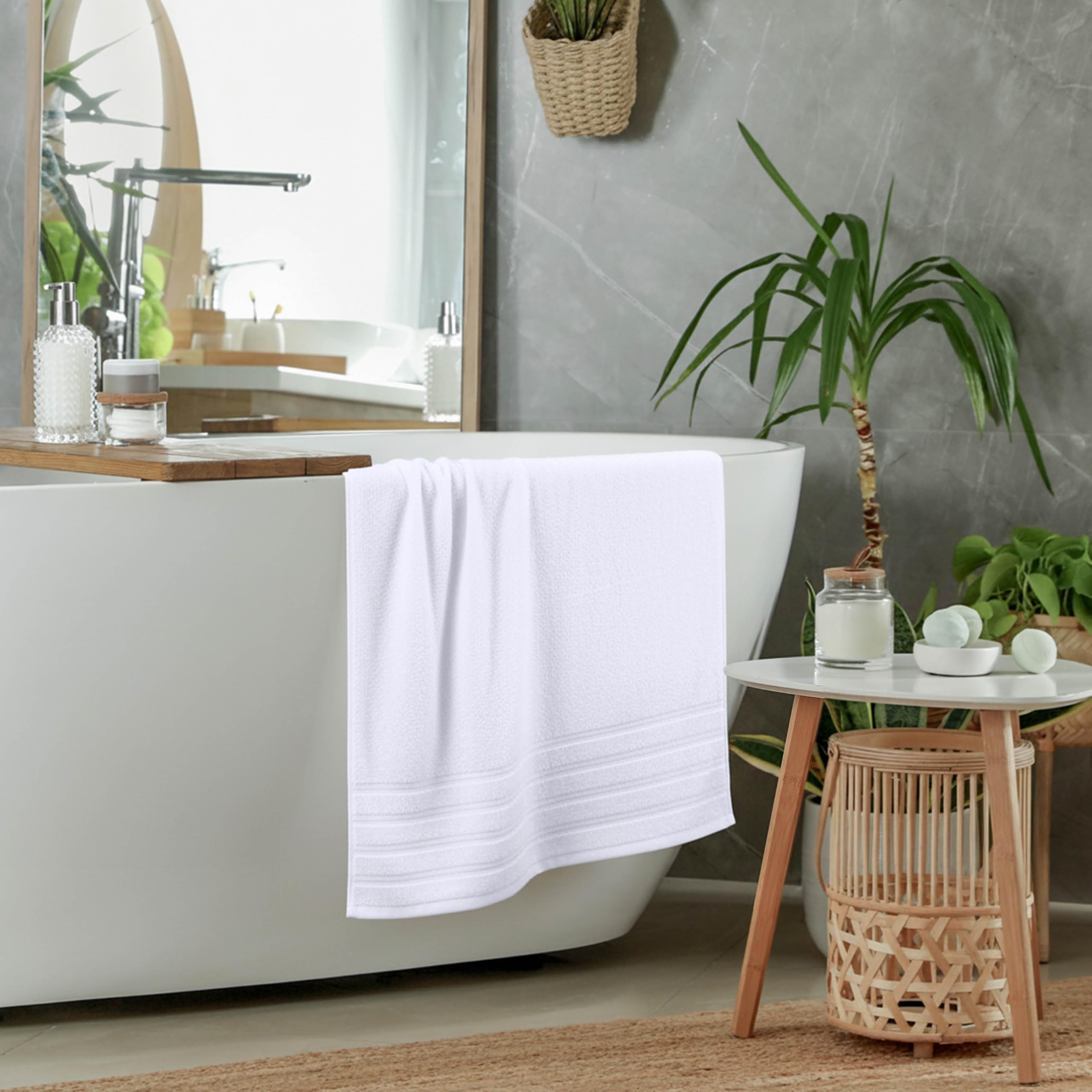 Utopia Towels beside ruler showing 30x60 inches size for generous body coverage