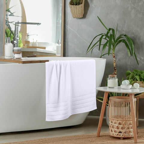 Utopia Towels beside ruler showing 30x60 inches size for generous body coverage