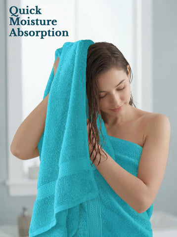 Utopia Towels beside a ruler illustrating the 27x54 size for full-body coverage