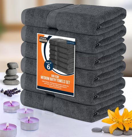 Utopia Towels size scale with ruler showing 24x48 inch coverage benefit