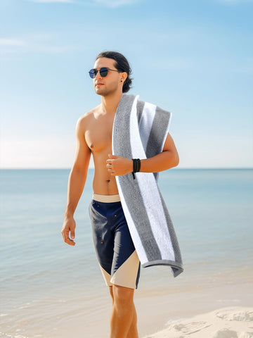 Utopia Towels draped poolside on chaise illustrating quick-dry and comfortable use