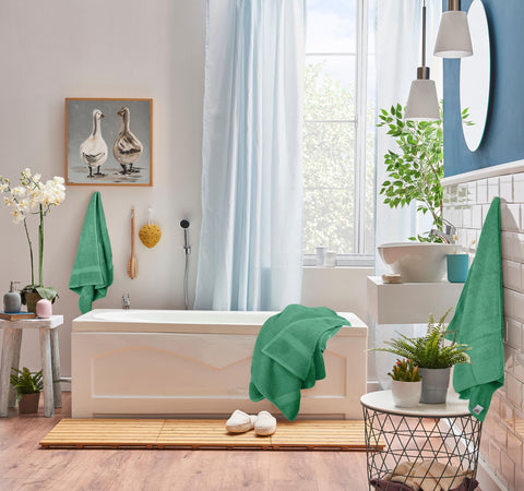 Utopia Towels washcloths arranged on sink for gentle facial care