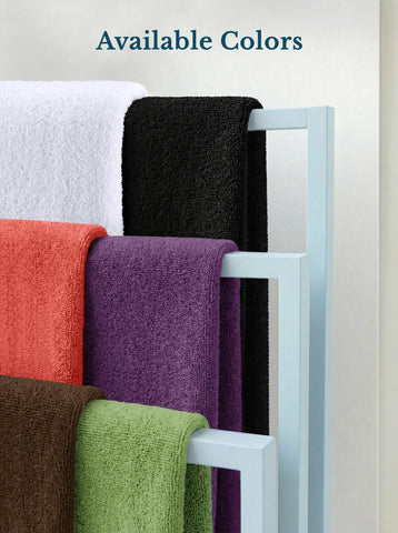 Utopia Towels placed near washing machine showing easy machine-wash care
