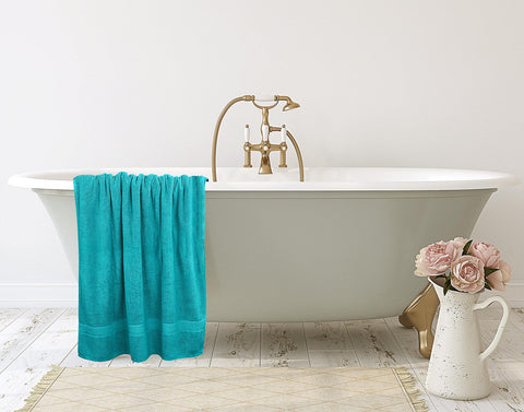 Utopia Towels absorbing water from skin showing strong absorbency benefit