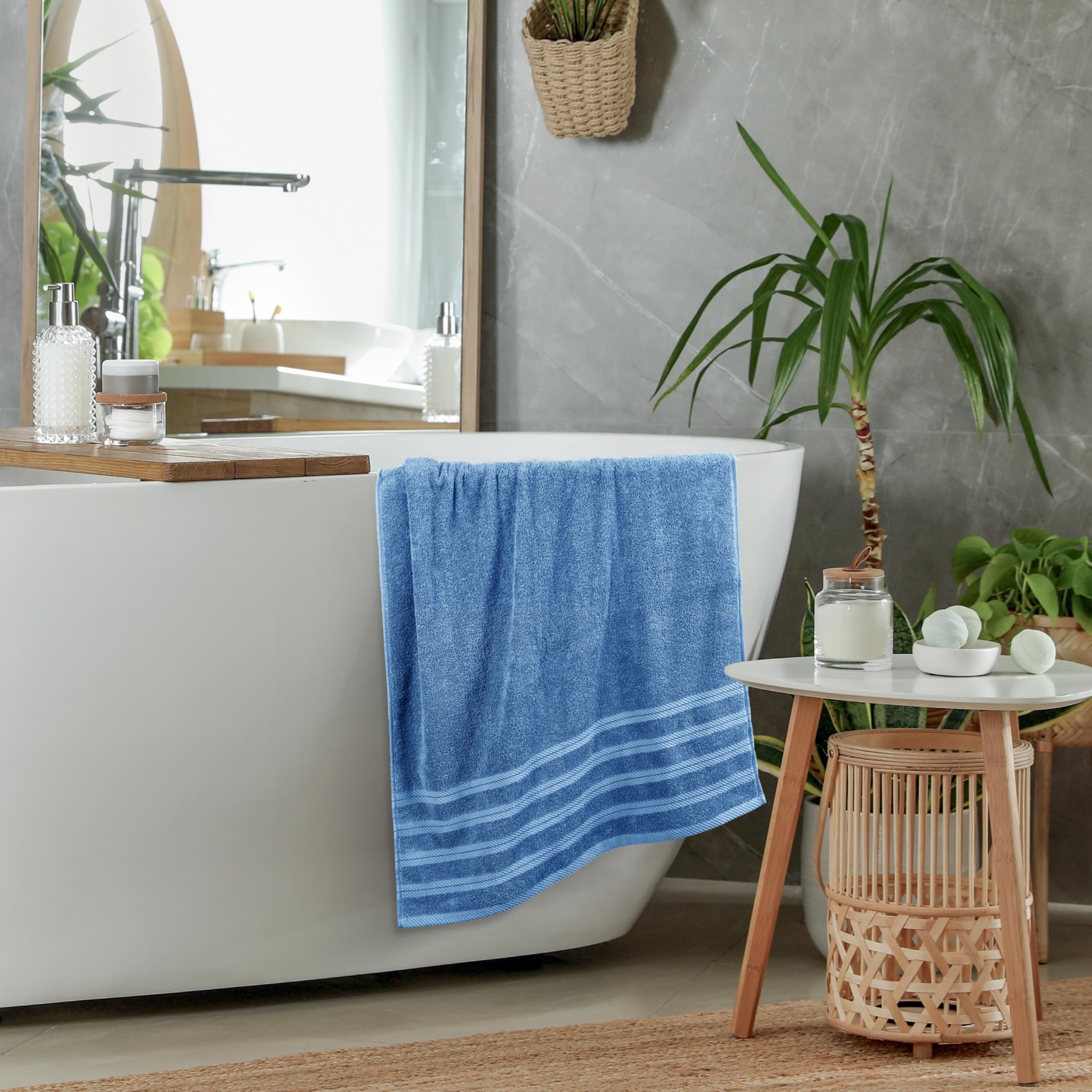 Utopia Towels wrapped on person showing generous 30x60-inch coverage benefit