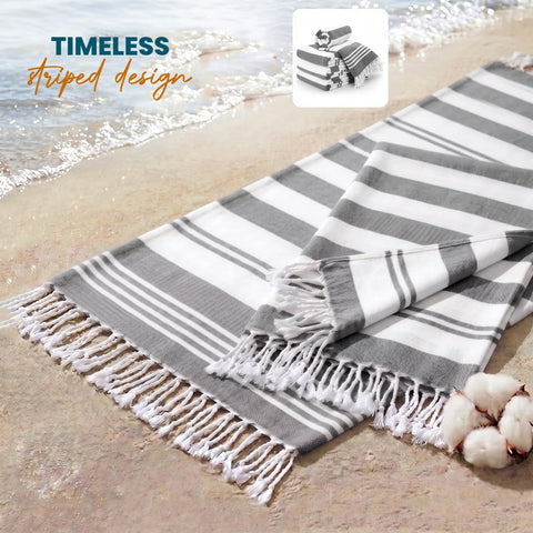 Utopia Towels in poolside lounge setting providing stylish relaxation