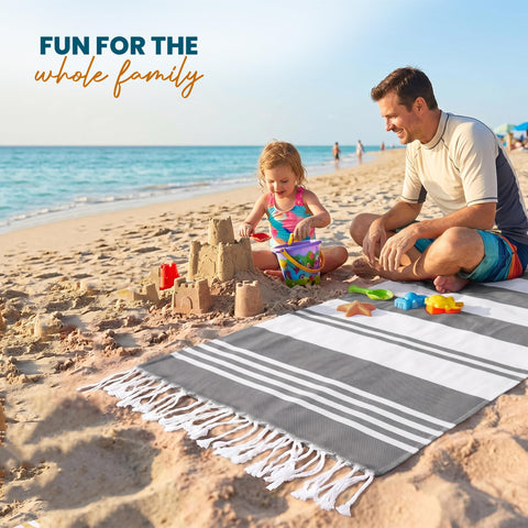 Utopia Towels size scale with sunglasses showing generous dimensions