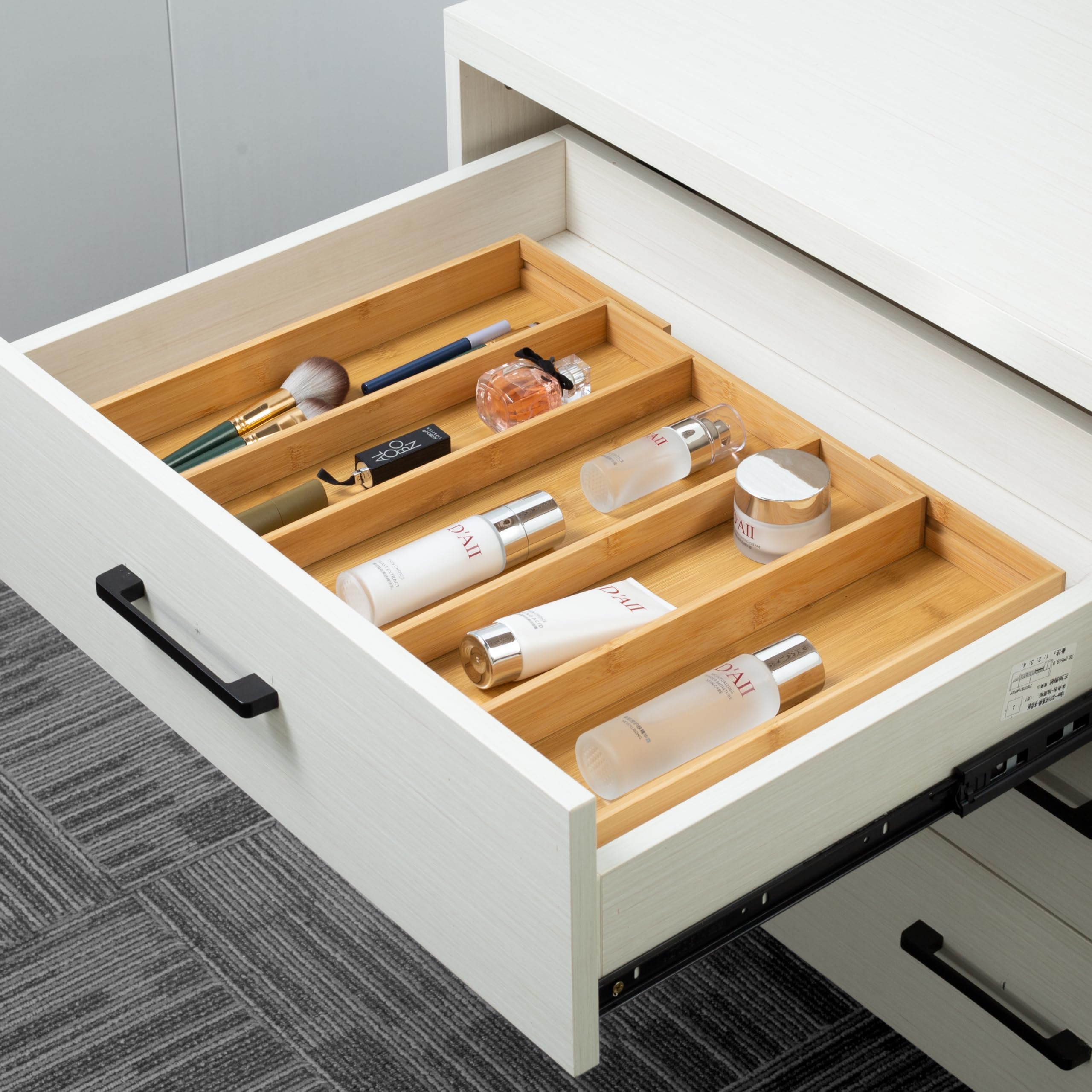 Utoplike placed inside drawer to illustrate scale and perfect fit benefit