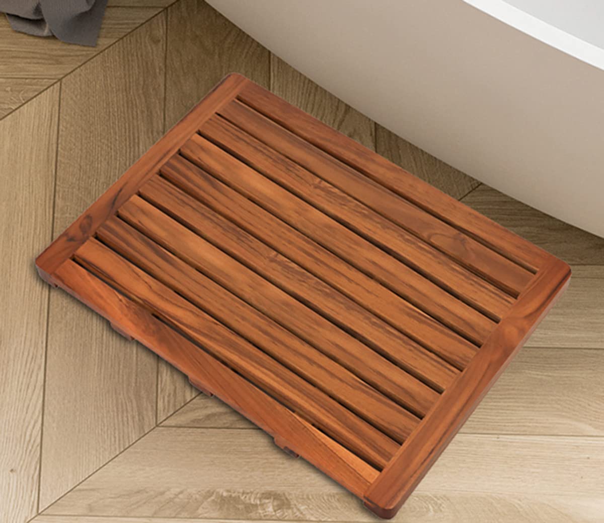 Utoplike mat styled with towels showing warm spa-like bathroom benefit