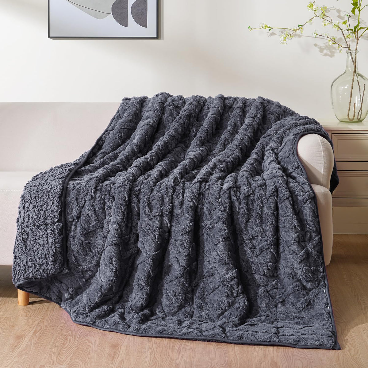 Uttermara front view showing dark grey blanket and refined jacquard for stylish comfort