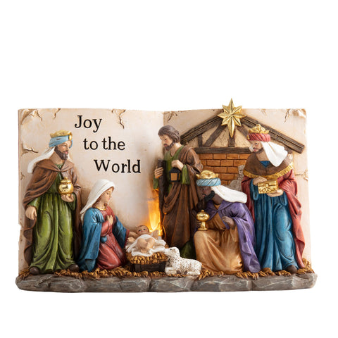 Valery Madelyn front view showing red gold nativity for elegant holiday focal point